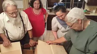 Story of restoration (by Leroy Beachy) of 500 year old German Bible made from Dutch ships old sails.