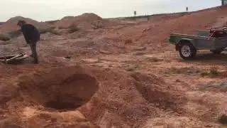 Arckaringa Basin/Coober Pedy Project 4 - Hole 21 - Inspecting the drill and surroundings
