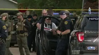 Armed suspect barricaded inside home