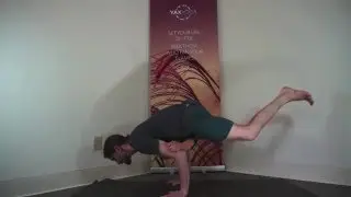 Yoga Demonstration of One-Legged Peacock (Advanced Arm Balance)