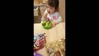 Little girl doesn't want candy, only broccoli - 1014320