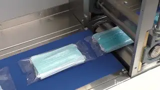 Face masks packaging machine