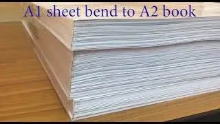 Binding A1 paper to A2 book