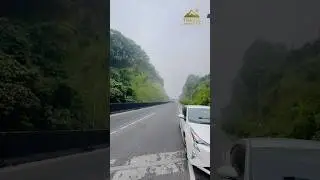 Beautiful misty highway views surrounded by lush green hills.#TravelAddiction  #bangladesh#hill #car
