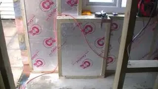 Studwork and insulation in garage conversion.wmv
