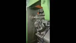 Automatic bevel gear cutting machine
