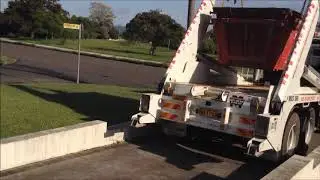 Matt's Skip Bins - Driver Mick delivering a 3 cubic metre General Waste bin on a narrow driveway