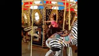 Bryson, Serenity, and Ashley merry go roundin it