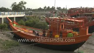 Fishing boats parked at the Frasergunj Harbour in West Bengal