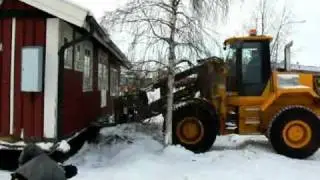 Lyftning av  Hus med Hjullastare