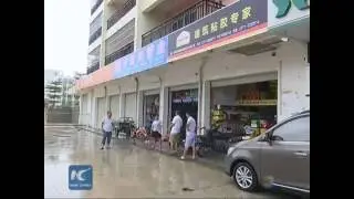 Typhoon Nida continues to unleash power after weakening to cyclone