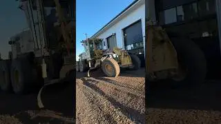 Jenex here with their grader getting a 2% slope away from the building and the driveway graded