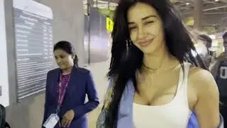 Disha Patani spotted at Mumbai airport in loose pants and shirt, keeps it stylishly casual