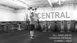 Tall Kneeling To Standing Overhead Dumbbell Hold