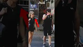 Chris and Elsa walking down the street