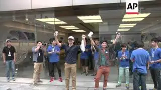 As Apple's new iPhone 6 went on sale around the world, there were some early customers queuing up to