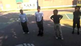 Comrade Arius teaching the children to be strong