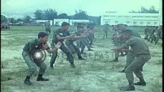 A South Vietnamese soldier demonstrates hand-to-hand combat to young cadets at a ...HD Stock Footage