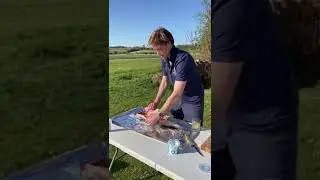 Arthur preparing a ChalkStream&reg; trout for the BBQ