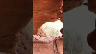 Adorable vintage kewpie baby under the red rock arch in Arches National park. #archesnationalpark