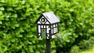 Multiholk Half-timbered Cottage Bird Feeder in Acion