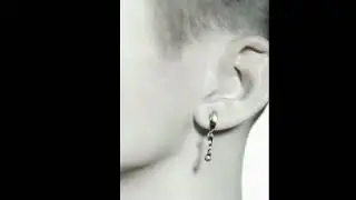 Silver dangling minimalistic earring with shell pearl