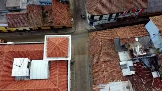 VideoVault Stock Video: Bogota Colombia roofs of a street aerial view