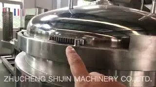 Fully automatic vertical pressure cooker for cooking soybean meat and so on.
