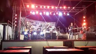 Asst. Parish Priest of St. Anthony's church Rev. Fr. Francisco  performs with the SAPYOS YOUTH BAND