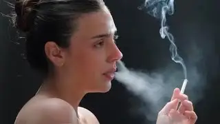 a smoking girl looking so sexy with cigarette smoking #smoking #cigarette