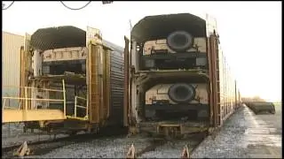 Osborne's Transport - Loading Hummers on Railcars