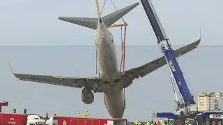 Plane which skidded off runway in Turkey rescued by large crane