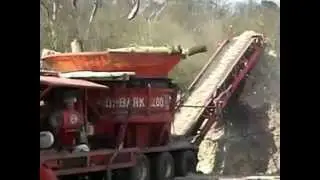 Making mulch with a Morbark 1200 tub grinder
