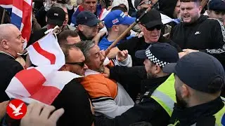 Police clash with anti-migrant protesters marching on Epping council