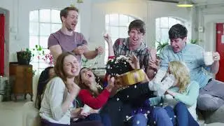 Group of Happy people Watching TV | Free Video loop