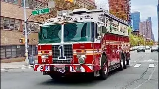 FDNY RESCUE 1 RESPONDING URGENTLY ON AMSTERDAM AVENUE ON WEST SIDE OF MANHATTAN IN NEW YORK CITY.