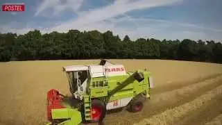 Loonbedrijf Postel uit Tilligte bezig met het dorsen van rogge Trekkerweb