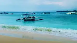 Your Ultimate Beach Escape: Blue Ocean Serenity with Gentle Waves and a Boat