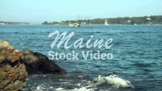 Ocean waves crash against scenic rocky Maine coast, slider shot | Maine Stock Video