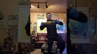 chinese man dancing with a suspension coil spring