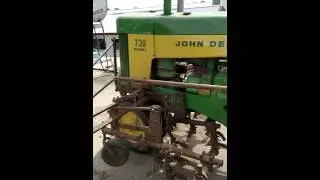 John Deere 730 with 6 row front mounted cultivator