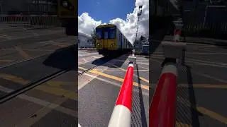 Merseyrail Class 508 flying across a level crossing #train #trainspotting #railway #shortsfeed