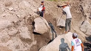 Loading Sand Waste In A Location Full Of Large Rocks..
