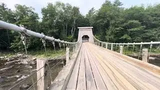 Walk across the old &ldquo;Wire Bridge&rdquo; in New Portland, Maine