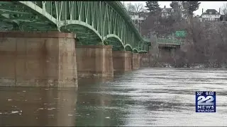 Heavy rain, melting snow causes cities to try and prevent flooding