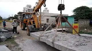 Hydra Crane Lifting Big Big Stone