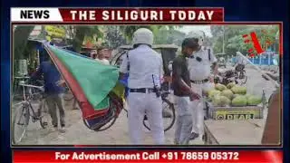 Traffic police launched a campaign to clear the footpath at Siliguri Jalpai More