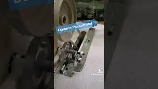 devanando hilo en m&aacute;quina plana . devanador