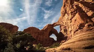 Clouds Over Sandstone Arches Stock Video