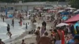 New French vaccination drive sees jabs by the beach